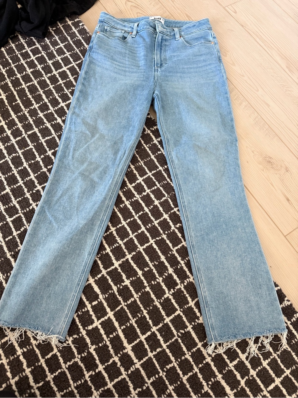 PAIGE Light Blue Flare Jeans with Raw Hem